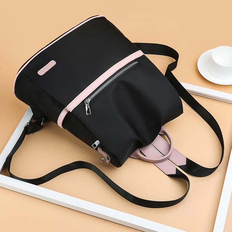 sac à dos oxford décontracté pour femmes, fourre tout d'école en nylon imperméable noir pour adolescentes de bonne qualité, fourre tout de voyage à la mode sac à dos oxford décontracté pour femmes, fourre tout d'école en nylon imperméable noir pour adolescentes de bonne qualité, fourre tout de voyage à la mode