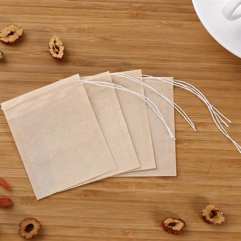 sachets de thé en papier biodégradable, 100 pièces, avec cordon de serrage, filtre écologique, sachets de thé vides, feuilles mobiles, poudre de thé, médecine à base de plantes sachets de thé en papier biodégradable, 100 pièces, avec cordon de serrage, filtre écologique, sachets de thé vides, feuilles mobiles, poudre de thé, médecine à base de plantes