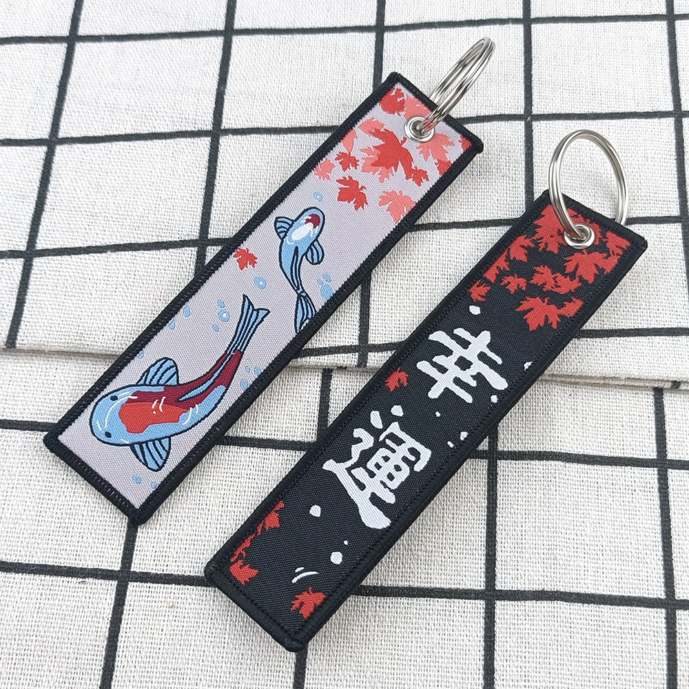 Porte-clés japonais porte-bonheur pour voiture, moto, porte-clés pour femmes, Jet Tag, bijoux à la mode, accessoires cadeaux