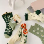 Femmes chaussettes coréen Style japonais dessin animé fleur verte Harajuku mignon Kawaii mi Tube chaussettes respirant décontracté court coton chaussettes