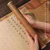 ensemble de longs volumes manuscrits avec stylo et encre, copie de calligraphie, livre à trois caractères, classique chinois