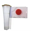 drapeau japonais à main 14*21cm, décoré avec un mât en plastique, utilisé pour les défilés de vacances