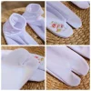 chaussettes élastiques brodées de fleurs à deux orteils, style japonais, mi mollet, séparateur d'orteils, bonneterie pour femmes, chaussettes à bout fendu, cosplay