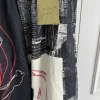 conception originale top yamamoto : pantalon à la cheville à imprimé floral yuka asakura, pantalon à jambes larges