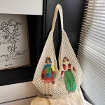 Sac à bandoulière tissé pour femmes coréennes, sac sous les bras de grande capacité, sac de plage de banlieue, nouvelle mode 2025, sac en filet à main pour femmes Sac à bandoulière tissé pour femmes coréennes, sac sous les bras de grande capacité, sac de plage de banlieue, nouvelle mode 2025, sac en filet à main pour femmes