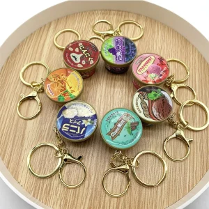 Porte-clés Miniature japonais drôle, décor de sac à dos créatif, pendentif de pincement à rebond lent, nouveauté, jeu de nourriture, Pudding à presser Porte-clés Miniature japonais drôle, décor de sac à dos créatif, pendentif de pincement à rebond lent, nouveauté, jeu de nourriture, Pudding à presser