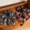 clip de conception d'arc d'atmosphère romantique et haut de gamme, accessoires de cheveux polyvalents et élégants pour femmes