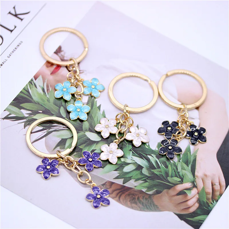 Tendance mignon émail porte-clés coloré Sakura fleur porte-clés doux porte-clés pour femmes filles sac à main accessoires bijoux à bricoler soi-même Tendance mignon émail porte-clés coloré Sakura fleur porte-clés doux porte-clés pour femmes filles sac à main accessoires bijoux à bricoler soi-même