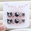10 pièces enfants dessin animé kuromi hello kitty ma mélodie presse sur ongles faux ongles manucure courte tête ronde avec nœud papillon faux ongles