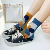 1 paire de chaussettes jacquard colorées à deux orteils pour femmes, en coton doux et respirant, à bout fendu, plantes chics amusantes, chaussettes tabi à rayures léopard