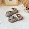 sandales pour enfants tissage nœuds simples filles chaussures de princesse ins à la mode décontracté 2025 été nouveaux enfants chaussures de plage évidé ins
