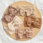 Joli bandeau pour nouveau-né fille, tricot élastique, Turban pour enfants, nœuds en Nylon doux, couvre-chef pour enfants, accessoires pour cheveux