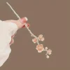 Épingle à cheveux élégante en forme de fleur de cerisier, en alliage japonais, avec motif floral rose, parfaite pour les petits pains hauts, occasions formelles de style hanfu