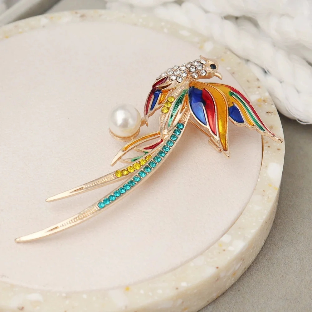 Nouvelle broche phénix en strass à la mode avec longue queue, accessoire exquis pour vêtements et sacs, pièce de tempérament polyvalente Nouvelle broche phénix en strass à la mode avec longue queue, accessoire exquis pour vêtements et sacs, pièce de tempérament polyvalente