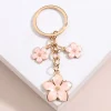 Porte-clés plante mignon Sakura fleur, en émail, pour femmes et filles, accessoire de sac à main, clés de voiture, bricolage, bijoux doux, cadeaux Porte-clés plante mignon Sakura fleur, en émail, pour femmes et filles, accessoire de sac à main, clés de voiture, bricolage, bijoux doux, cadeaux