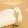 bijoux fins style anniversaire cadeau zodiaque dragon décoration hotan jade bracelet lumière luxe sens avancé pour les femmes