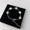 Bracelet élégant coréen japonais à cinq pétales de fleurs, à la mode, polyvalent, personnalisé, Micro-ensemble de bijoux floraux en cuivre Bracelet élégant coréen japonais à cinq pétales de fleurs, à la mode, polyvalent, personnalisé, Micro-ensemble de bijoux floraux en cuivre