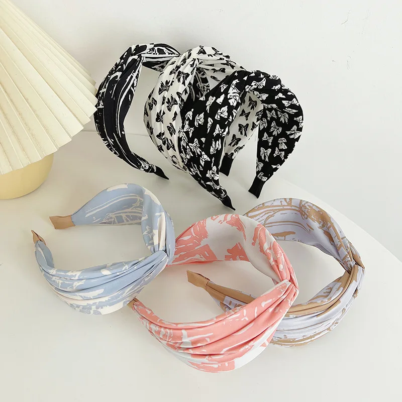 version coréenne de la mode nouveau cerceau de cheveux tissu imprimé accessoires de cheveux à large bord cerceau de tête accessoires de tête de conception simple version coréenne de la mode nouveau cerceau de cheveux tissu imprimé accessoires de cheveux à large bord cerceau de tête accessoires de tête de conception simple