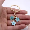 tendance mignon émail porte clés coloré sakura fleur porte clés doux porte clés pour femmes filles sac à main accessoires bijoux à bricoler soi même
