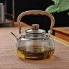 théière en verre borosilicate résistant à la chaleur, 37oz/1000ml, avec bec anti goutte, manche en bois de pêche et couvercle, coffre fort pour cuisinière