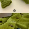 cardigan en fourrure de raton laveur avec bouton en corne verte pour femme, pull décontracté, marchandises européennes, optique, automne et hiver