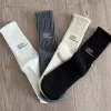 Chaussettes de sport respirantes en coton pour hommes et femmes, chaussettes décontractées monochromes, chaussettes Hip Hop Skateboard, nouveau créateur, équipage, automne, hiver