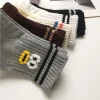 chaussettes de créateurs style coréen dessin animé mignon expression ludique chaussettes femmes à la mode japonais pur coton amusant original mi mollet chaussettes