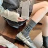 chaussettes unisexes pour hommes et femmes, tube haut en coton, chaussettes de sport de haute qualité, solides, noires et blanches