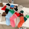 Chaussettes de couleur contrastée à la mode et polyvalentes pour femmes, chaussettes montantes à empiler, version coréenne de chaussettes en coton printemps/été Chaussettes de couleur contrastée à la mode et polyvalentes pour femmes, chaussettes montantes à empiler, version coréenne de chaussettes en coton printemps/été
