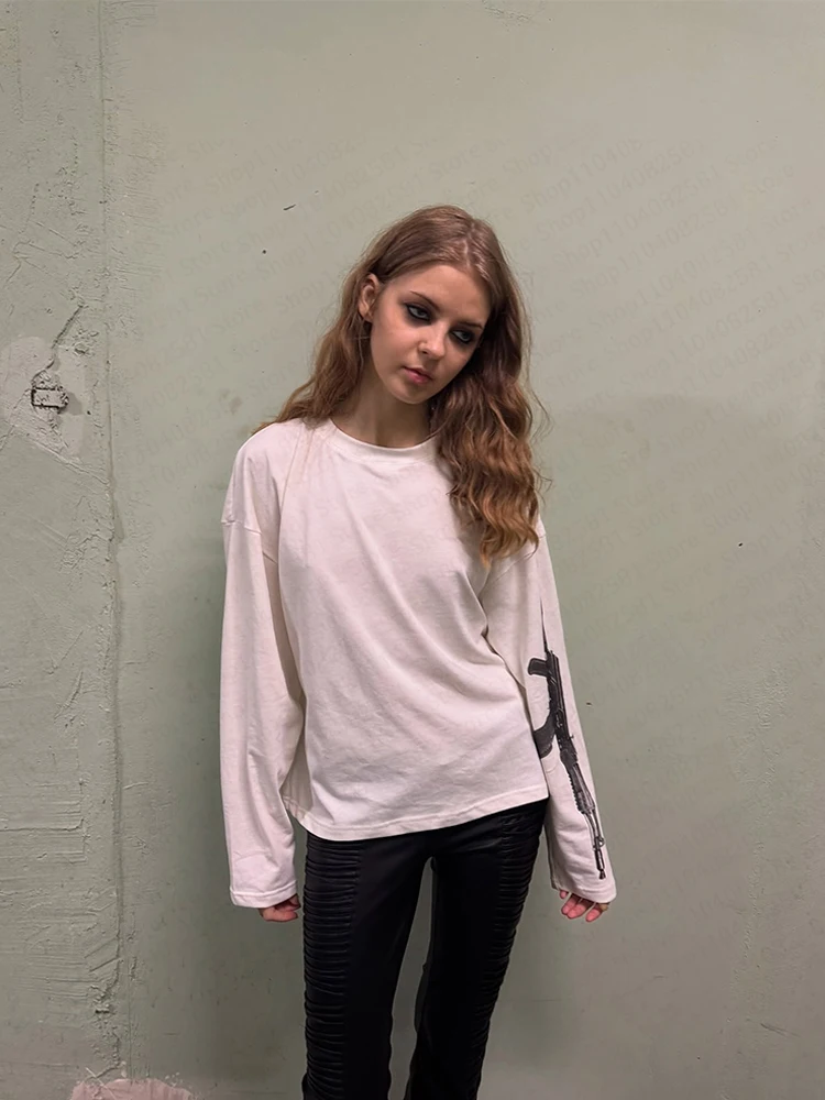 harajuku années 90 streetwear gothique bébé t shirt avec motif imprimé pistolet t shirt à manches longues emo fille coupe ajustée y2k kawaii haut tendance harajuku années 90 streetwear gothique bébé t shirt avec motif imprimé pistolet t shirt à manches longues emo fille coupe ajustée y2k kawaii haut tendance
