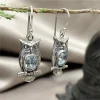 boucles d'oreilles vintage en métal couleur argent, hibou sculpté, rondeur d'originalité incrustée, pierre bleue de mer