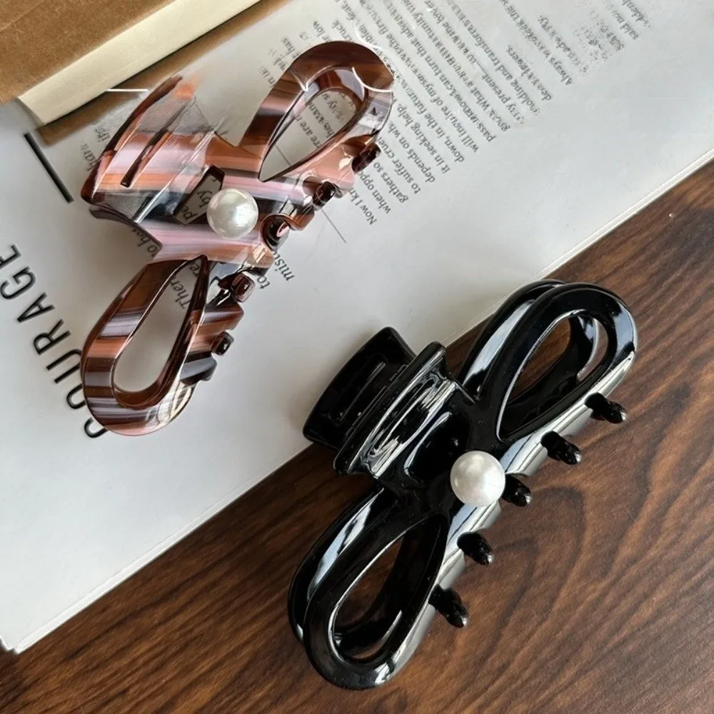 Épingle à cheveux design français femmes griffes de cheveux ornement de cheveux perle queue de cheval pinces à cheveux léopard rétro dame requin pince pour filles chapeaux Épingle à cheveux design français femmes griffes de cheveux ornement de cheveux perle queue de cheval pinces à cheveux léopard rétro dame requin pince pour filles chapeaux