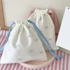 pochette à couches en toile, pochette portable avec nœud imprimé, sac de rangement à cordon de serrage, sac suspendu à cordon de serrage moyen et grand, shopping