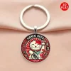 porte clés porte bonheur en alliage de chat rouge, pendentif, motif de chat adorable, style de banlieue à la mode, unisexe, bijoux d'oreille d'animal durables