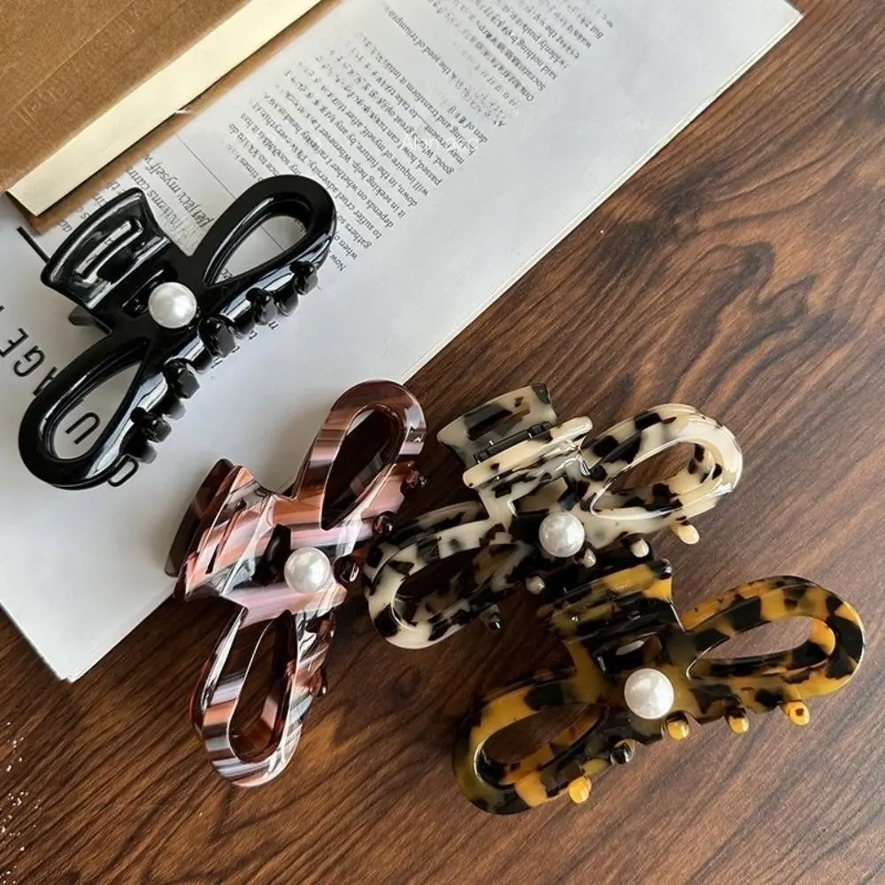 Épingle à cheveux design français femmes griffes de cheveux ornement de cheveux perle queue de cheval pinces à cheveux léopard rétro dame requin pince pour filles chapeaux Épingle à cheveux design français femmes griffes de cheveux ornement de cheveux perle queue de cheval pinces à cheveux léopard rétro dame requin pince pour filles chapeaux