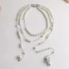 collier multicouche élégant à franges en perles, niche haut de gamme, sensation asymétrique, chaîne de cou drapée, collier vintage tendance