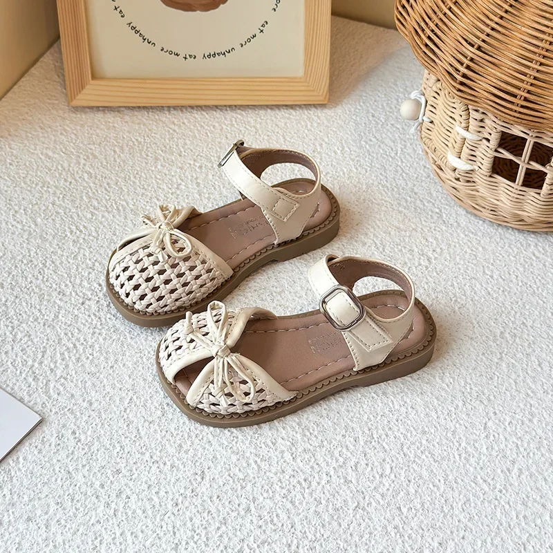 sandales pour enfants tissage nœuds simples filles chaussures de princesse ins à la mode décontracté 2025 été nouveaux enfants chaussures de plage évidé ins sandales pour enfants tissage nœuds simples filles chaussures de princesse ins à la mode décontracté 2025 été nouveaux enfants chaussures de plage évidé ins