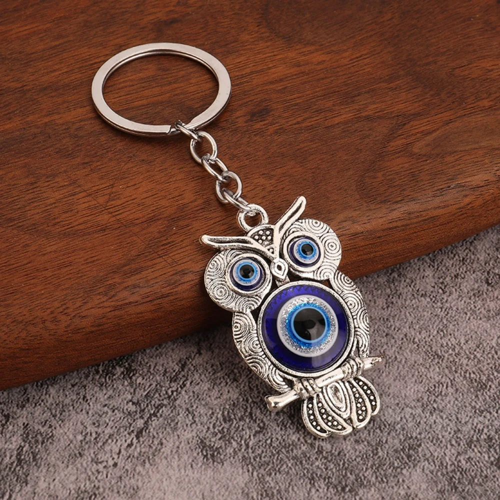 Couleur argent bleu profond hibou Animal femmes sac accessoires religieux mauvais œil porte-clés pendentif voiture clé et porte-clés Couleur argent bleu profond hibou Animal femmes sac accessoires religieux mauvais œil porte-clés pendentif voiture clé et porte-clés