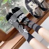 1 paire de chaussettes jacquard colorées à deux orteils pour femmes, en coton doux et respirant, à bout fendu, plantes chics amusantes, chaussettes tabi à rayures léopard