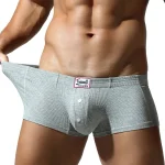 Sous-vêtements plats pour hommes, en coton synthétique, haute élasticité, surélevés, décoration de boutons, coupe slim confortable, couleur unie Sous-vêtements plats pour hommes, en coton synthétique, haute élasticité, surélevés, décoration de boutons, coupe slim confortable, couleur unie