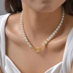 Collier de perles d’imitation exquis pour femmes, Rivets ovales, accessoires, colliers en acier inoxydable, bijoux cadeaux de couleur or Collier de perles d’imitation exquis pour femmes, Rivets ovales, accessoires, colliers en acier inoxydable, bijoux cadeaux de couleur or