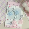 porte clés pendentif fleur et beurre translucide romantique, clé sakura simulée, résine jonone blossom jelly