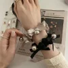 style coréen élégant haut de gamme papillon noeud perle attaches de cheveux femmes bandes de cheveux populaire coréen nouveau modèle accessoires de cheveux