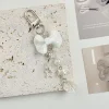 chaîne de téléphone portable avec nœud pour fille, nouveau style ins japonais et coréen, sac perlé fait à la main, porte clés de voiture suspendu, pendentif de sac pour carte d'appareil photo