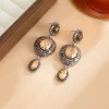 boucles d'oreilles à pampilles incrustées de pierres précieuses ovales de style ethnique rétro, bijoux à breloques de vacances à la mode et exagérés, cadeaux