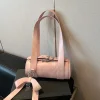 sac à main à nœud coréen pour femmes, design cylindrique, mode de luxe, sac à bandoulière simple et exquis, ceinture de verrouillage en argent, sac sous les bras haut de gamme