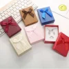 Boîte-cadeau de bijoux pour femmes, 1 pièce, motif à carreaux, décor d’arc, pour emballage de bijoux Boîte-cadeau de bijoux pour femmes, 1 pièce, motif à carreaux, décor d’arc, pour emballage de bijoux
