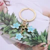 tendance mignon émail porte clés coloré sakura fleur porte clés doux porte clés pour femmes filles sac à main accessoires bijoux à bricoler soi même