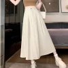 demi jupe de costume couleur fleur de cerisier pour femmes, jupe longue plissée amincissante, ligne a en forme de poire, couverture du corps, hanche, noire, nouvelle collection 2025