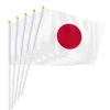 Drapeau japonais à main 14*21cm, décoré avec un mât en plastique, utilisé pour les défilés de vacances